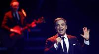 Robbie Williams selling his soul for World Cup gig