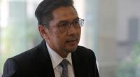 Malaysia civil aviation chief resigns over MH370 lapses