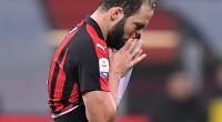 Higuain misses penalty and sent off as Juve win at Milan
