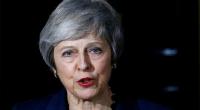 May battles to save Brexit deal as ministers quit