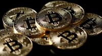 Bitcoin drops to one-year low as slump persists