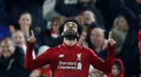 Salah fires Liverpool into Champions League last 16