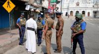 Sri Lanka on edge with lock-downs, raids for suspects