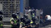 Twenty-nine detainees killed in Venezuela police station cellblock riot