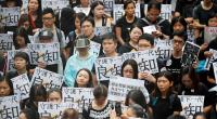 Hong Kong tense as weekend of protests begins with teachers' rally in rain