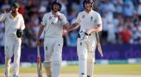 Root digs in to give England hope