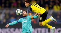 Unlucky Dortmund draw with Barca on Messi return