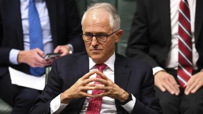 Australian PM stubbornly clings to power, offers possible second leadership vote
