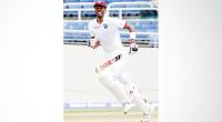 Chase fifty fuels Windies fight after Kuldeep strikes