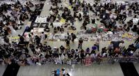 Hong Kong airport reopens, China urges end to violence