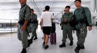 Hong Kong riot police curb airport protest after clashes