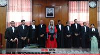 Nine additional justices take oath
