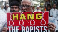 India rape victim set ablaze on way to court