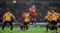 Liverpool charge towards title with win at Wolves