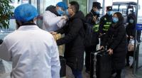 China records first virus death in Beijing as toll passes 100