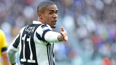 Douglas Costa gets four-match suspension for spitting