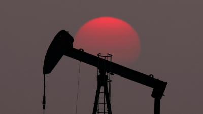 Oil bounces 8% on stimulus hopes, virus slowdown in China