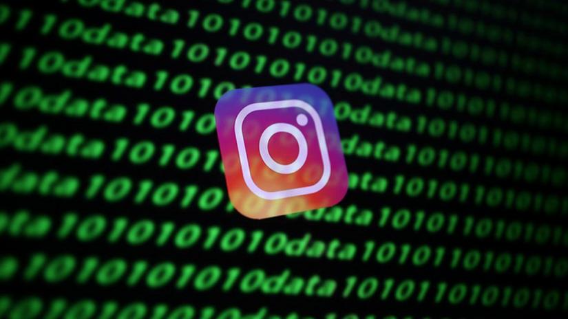 The Instagram logo and binary cyber codes are seen in this illustration taken Nov 26, 2019. REUTERS/Illustration